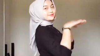 rocking veiled woman