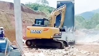 The excavator operator got angry and destroyed the truck