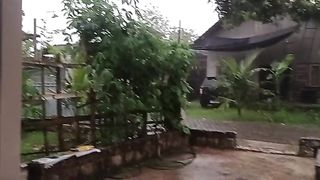 A beautiful sunset wrapped in heavy rain, wind and lightning in rural Indonesia, for study , sleep and relax