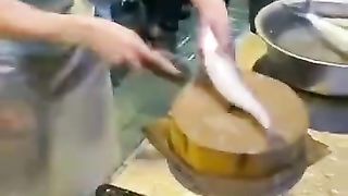 Look at the speed how he do that how fast he cut the fish. Really so fast.