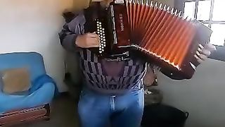 Me playing a tune in my living room.