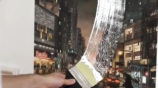 Painting over a cityscape :Super talented.