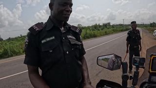 Corrupt Nigerian Police Officer demands MONEY