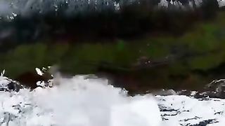 High Ultimate clearing the snow - Base jump