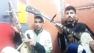 Playing the banjo with my friend