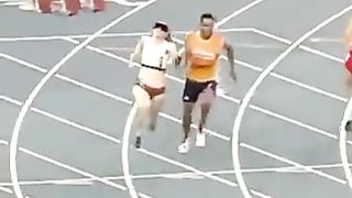 Paralympic blind runner with her guide!  Perfect teamwork!
