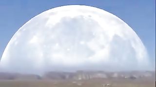 The moon comes so close to the earth that it almost collides with the earth