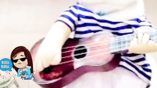 Strumming the Guitar and Singing the White Cat Version