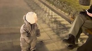 Group of Girls Catch Baby's Attention