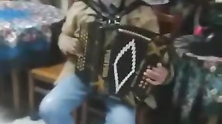 jose avelino playing the concertina.