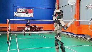 Human vs Ai Robot playing badminton