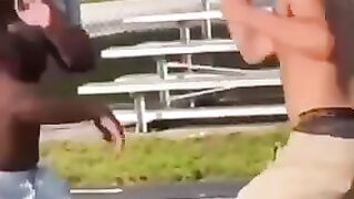 Two men fighting over a cheeseburger