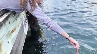 a girl fishing with sausage