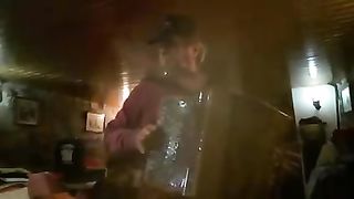 man playing concertina