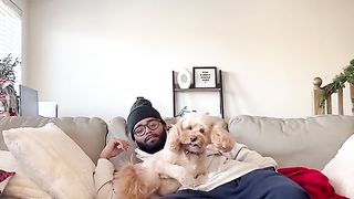 Trying to watch tv with a loving dog