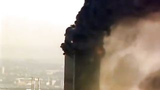 View of the World Trade Center collapse from a helicopter.
