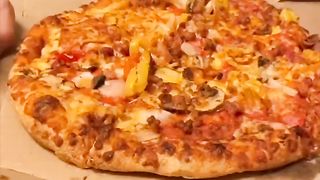 Giving my Iron Chef Dad Dominoes Pizza...