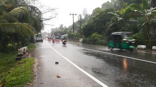 A Rainy Day at a Busy Road ????