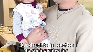 Our daughter's reaction to seeing snow for the first time #shorts