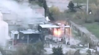 Russian tanks and artillery strike at Ukrainian positions in the fortress town of Maryinka