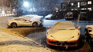 Ferrari Sports Car Parked While Snowing 2