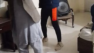 Old man dancing and singing with college students - cloudy English
