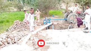 When water was drawn from the new tubewell for the first time, why was the water like that_