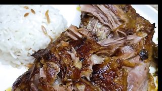 Shoulder of lamb cooked in the oven for 7 hours (tender and moist as desired)