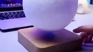 Magnetic floating moon lamp