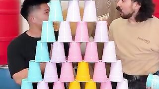 Cup-stacking_game_turns_into_a_money_spinner_for_friends!_#shorts (360p).