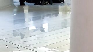 A bunch of Paul Blarts taking down a guy in Mall Of America.