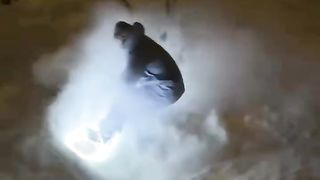 Sliding on the snow at night time