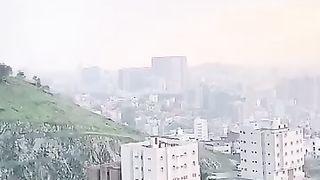 The buildings and roads in the neighborhood