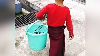 Small monk cleans up at monastery
