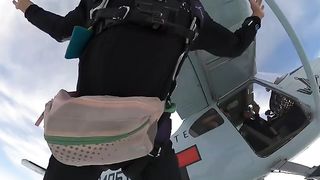 Man eating while skydiving