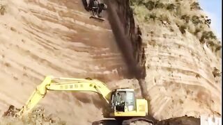 name Spider Excavator on a Cliff.