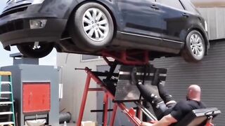 Brian Shaw Leg Presses a 2,000-Pound Car.