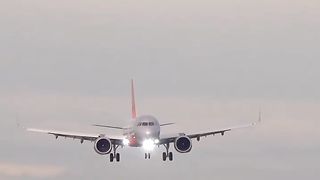 Airplane landing on runway Magistic View