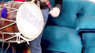 Arishma playing Dhol.