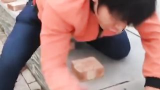 Lad smashes 50 bricks in 40 seconds with his bare hands!