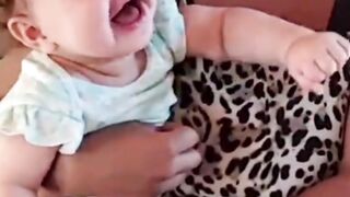Funny baby playing with the dog 4