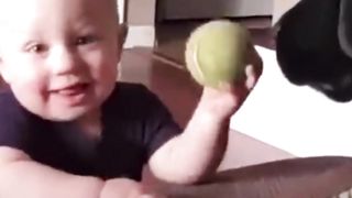 Funny baby playing with the dog 5