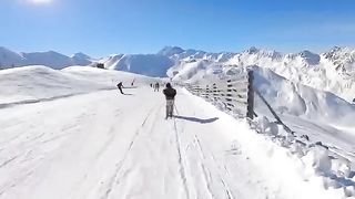 SNOWBOARDER TRYING TO CATCH SKIER!