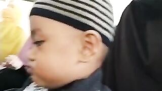 Funny kid is dancing when listening music