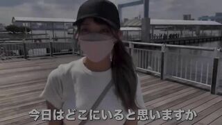 japanese girl walking on odaiba rainbow bridge