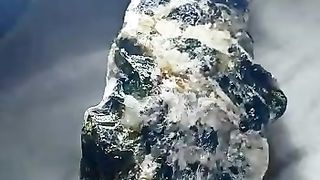 Ekanite with host matrix