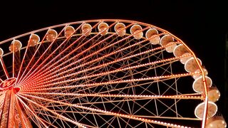 "Whirl of Wonder: A Mesmerizing Ferris Wheel Journey"