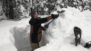 Camping Under the Snow in Survival Shelter