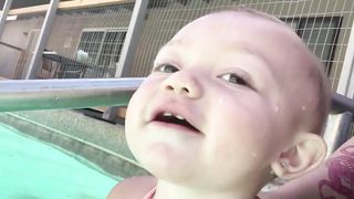 Children playing in the water and they are very funny
