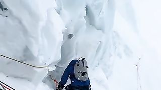 Climbing on snowy hill